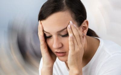 Woman Suffering From Headache Dizziness